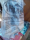 T.V. Memorabilia Kds meal prz. Flipper Squirting Glove sealed in org. cntnr.